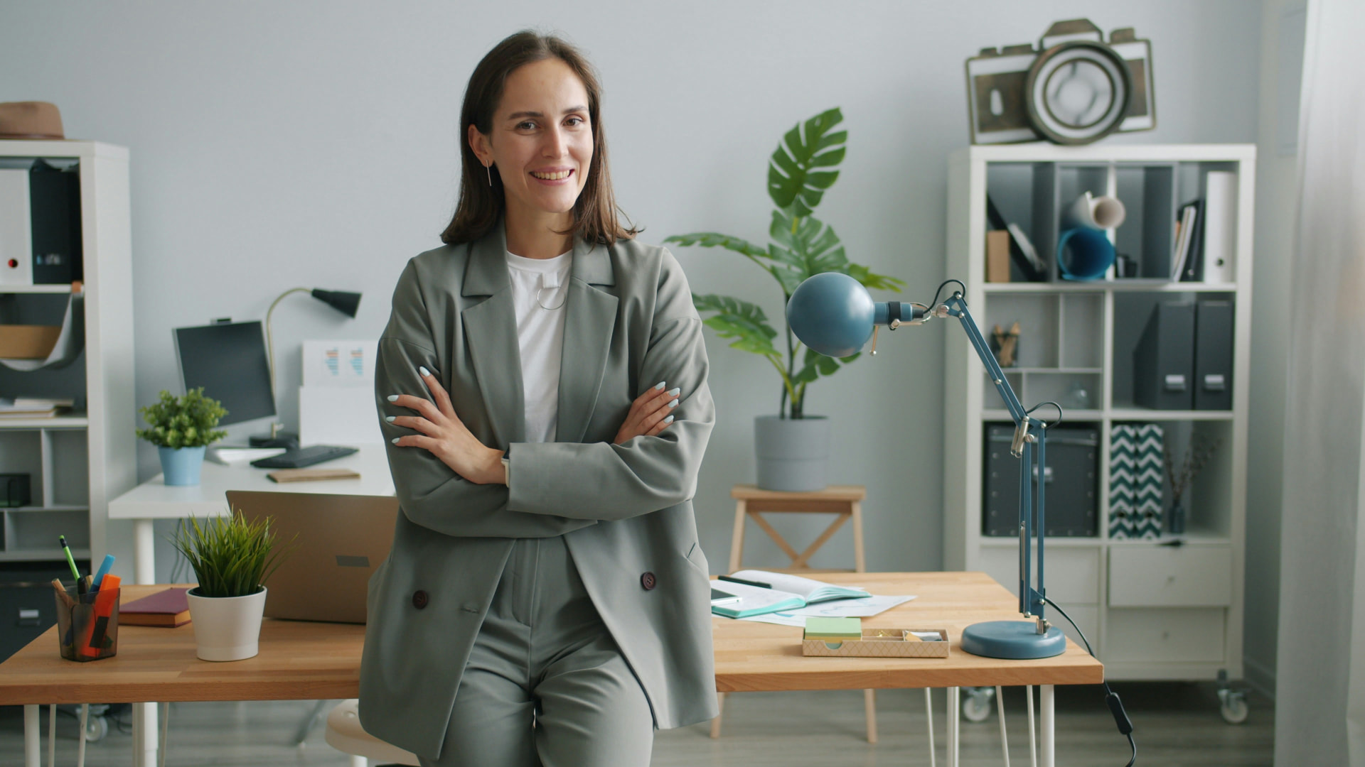 Confident woman business owner in her Wichita office