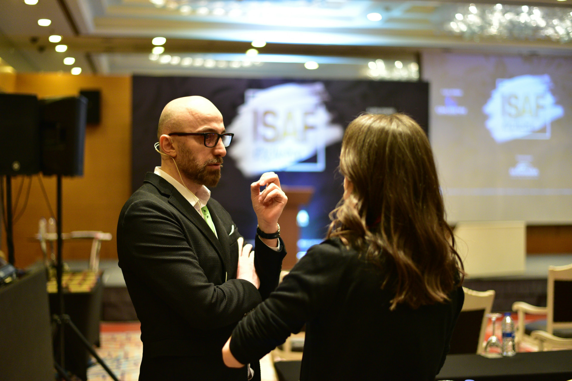 Business professionals talking one-on-one at a Wichita networking event